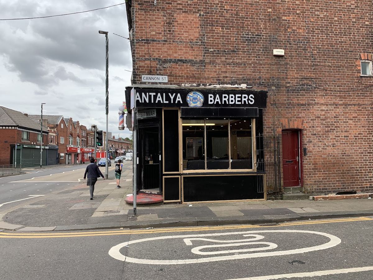 The Antalya Barbers corner unit with its barber pole