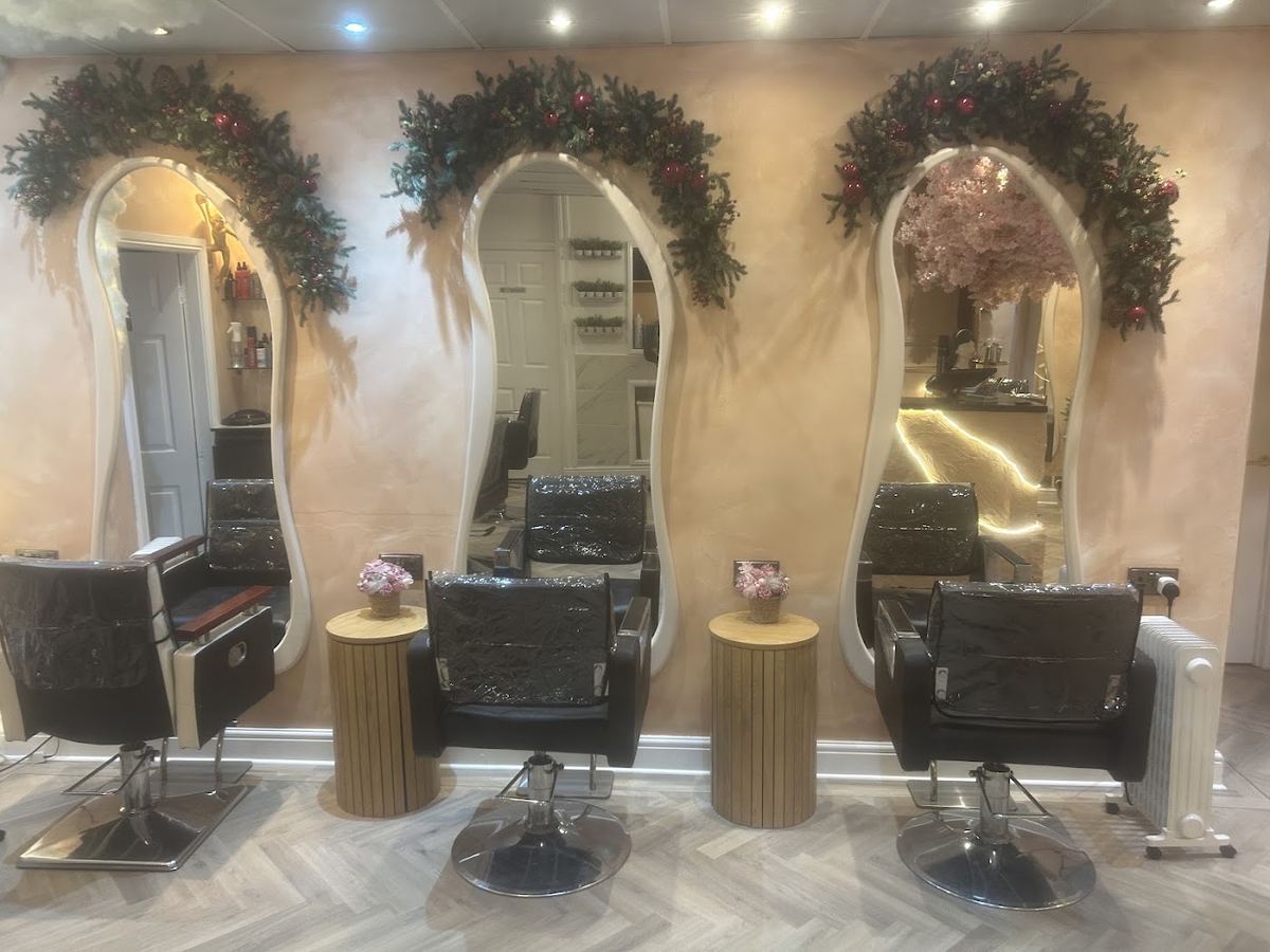 Inside Anthony B Salon, arched mirrors above the styling chairs