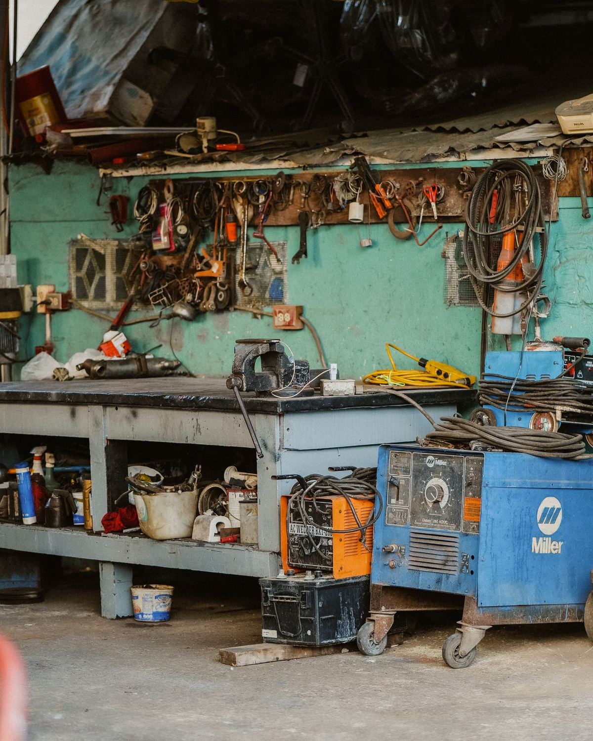 A working garage workbench with tools