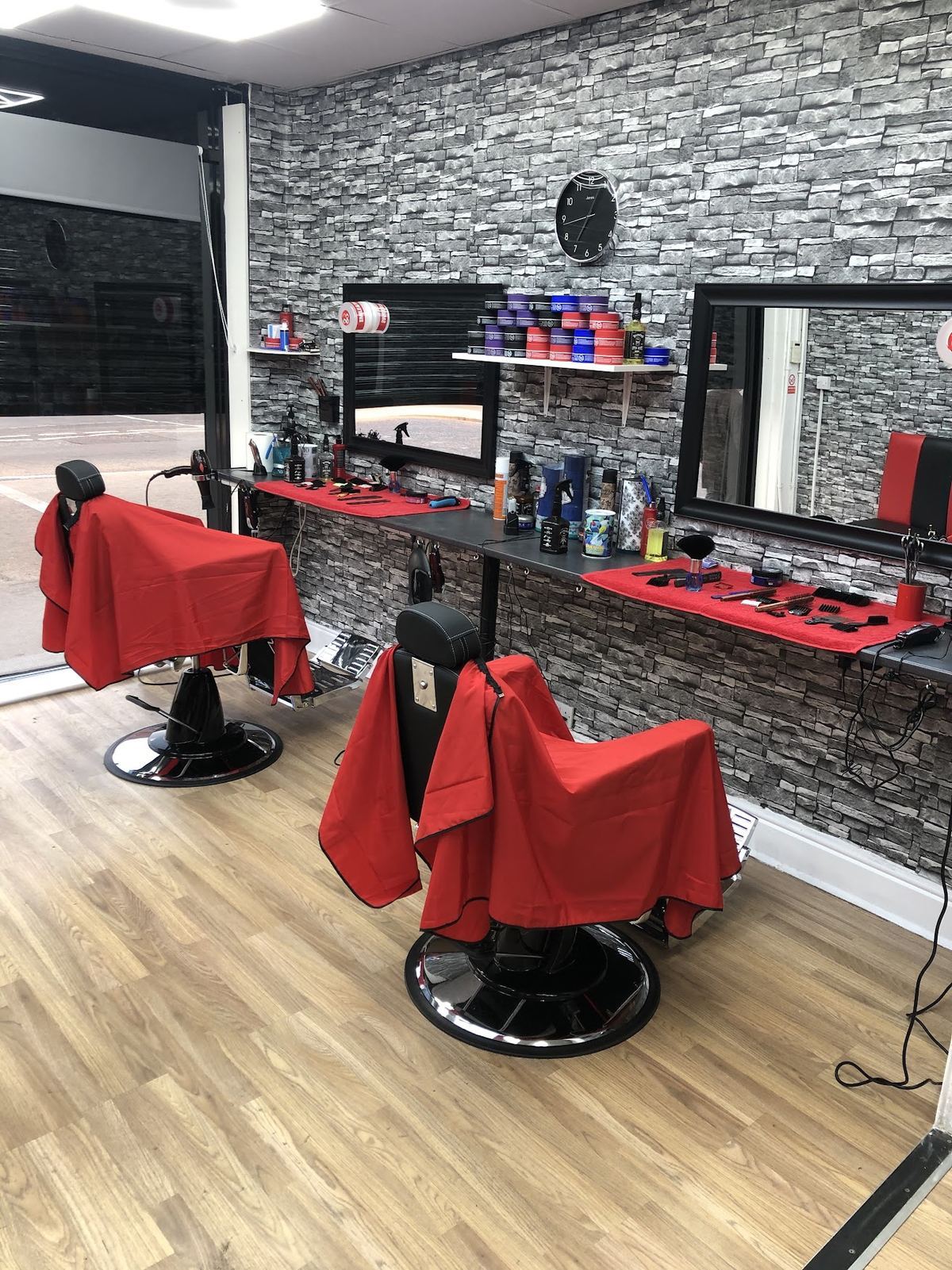 Inside Cleancut barber shop looking toward the window and the chairs