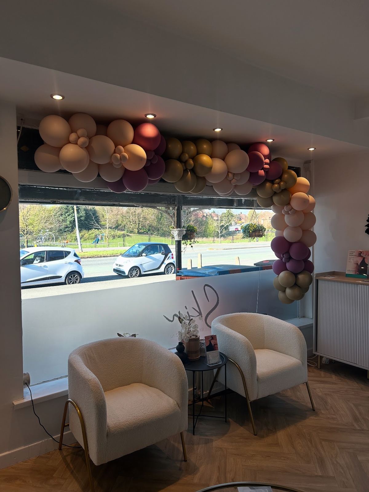 The waiting area at ICONIC, two chairs by the window onto Ellesmere Street