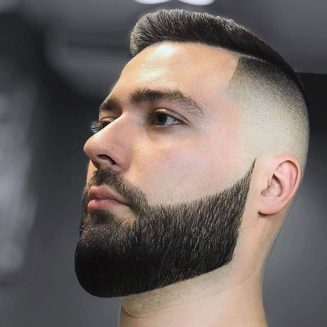 A finished skin fade and beard shape at RAZOR Barbers